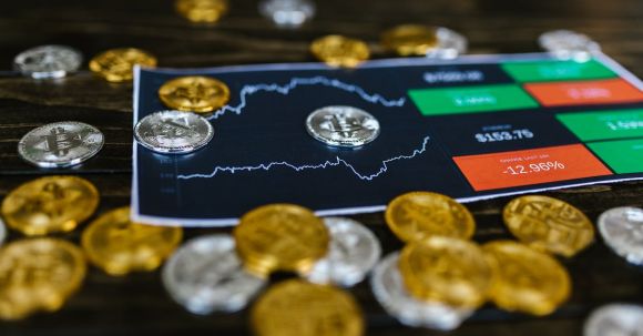 Crypto Trading - Selective Focus Photo of Silver and Gold Bitcoins